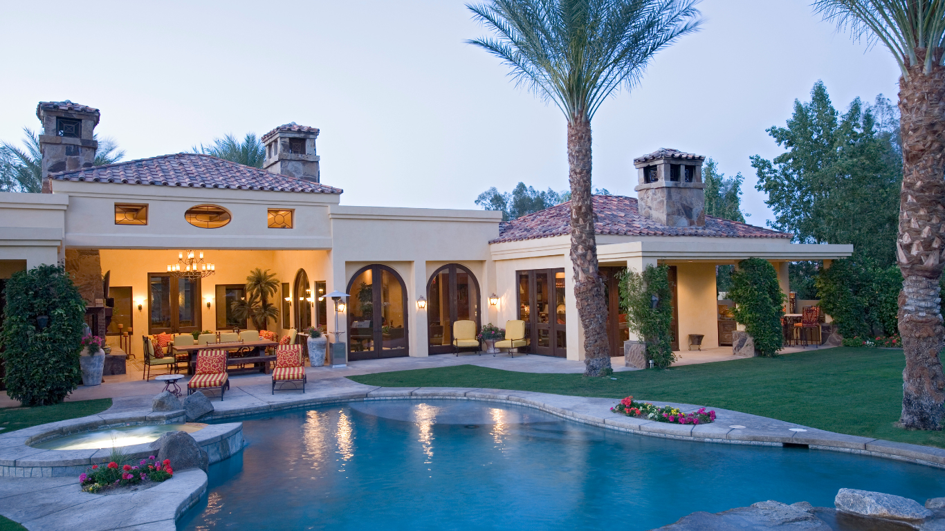 Luxury home with pool and palms in Rosemary Beach FL coastal setting